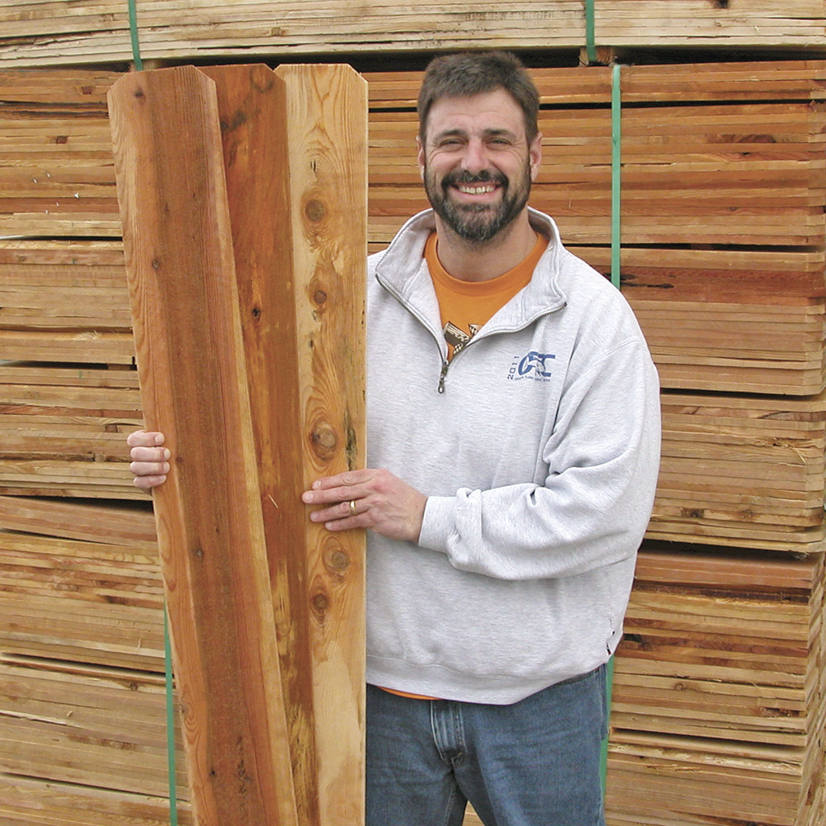 Lumber Yard Manager, Cliff with wooden fence boards